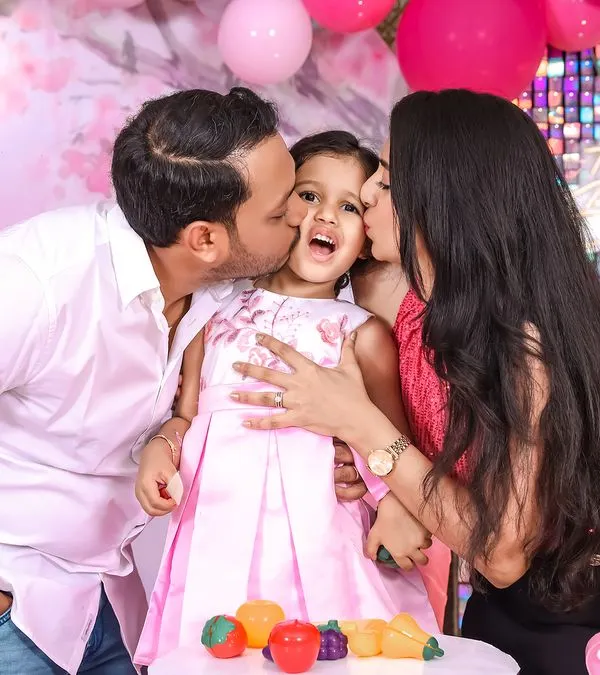 A moment of pure joy and love. We live for these unscripted kisses and happy squeals that make birthday memories so precious.
