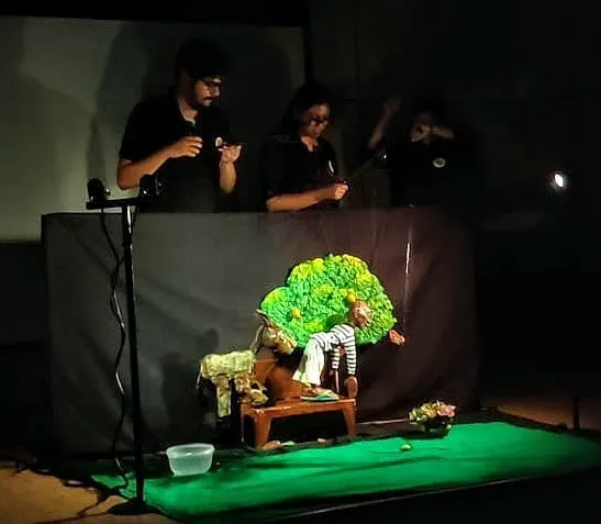 Our team performing a show with a fully detailed stage set, complete with trees and furniture. These back-to-back shows at Auden school were a fun day for everyone involved.