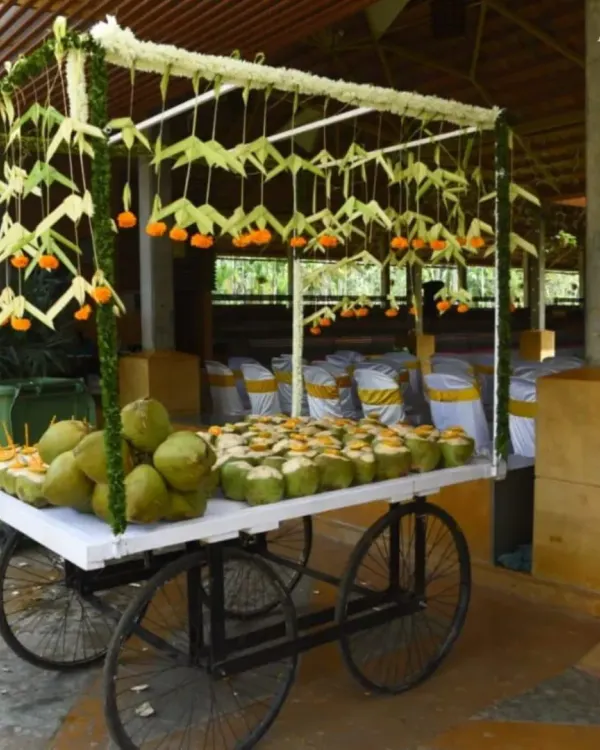 To keep guests refreshed during a warm outdoor ceremony, we set up this charming tender coconut water cart. It's a healthy, hydrating, and delightful touch that celebrates local flavors and enhances the guest experience.