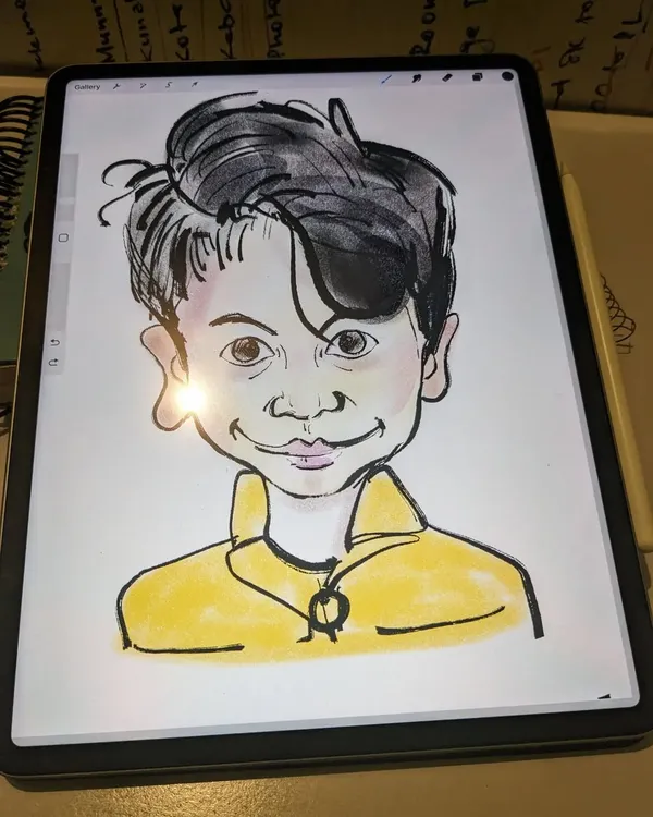 A look at a digital caricature portrait being drawn on a tablet. This medium combines traditional drawing skills with modern technology.