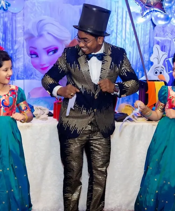 I love getting the kids involved right from the start. Here I am with two happy assistants during a magic show for a Frozen themed birthday party at the Courtyard by Marriott hotel in Nerul.