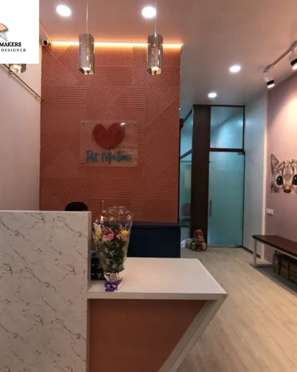 The reception area of 'Pet Mates' boutique, designed to be inviting for both pet owners and their companions. The warm color palette, geometric wall texture, and clear branding create a welcoming and professional first impression.