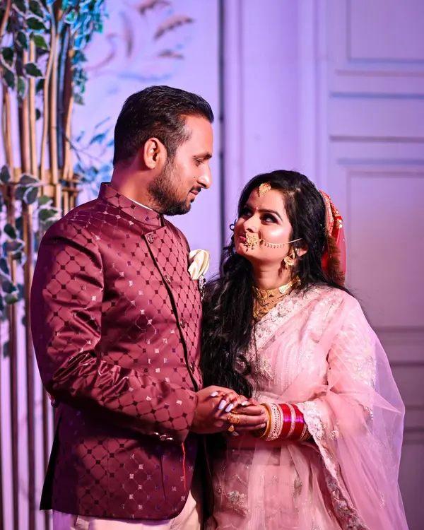 A candid moment between the couple during their reception. It's these unposed, loving glances that truly tell the story of the day, captured in a natural and authentic way.