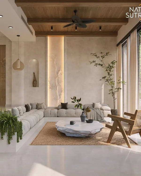 This is where organic modern design meets serene tranquility. We designed this living space to be a sanctuary, using natural wood beams, a sculptural stone coffee table, and an abundance of greenery to blur the line between indoors and out. The result is a home that feels both grounding and luxurious, a place to slow down and simply be.
