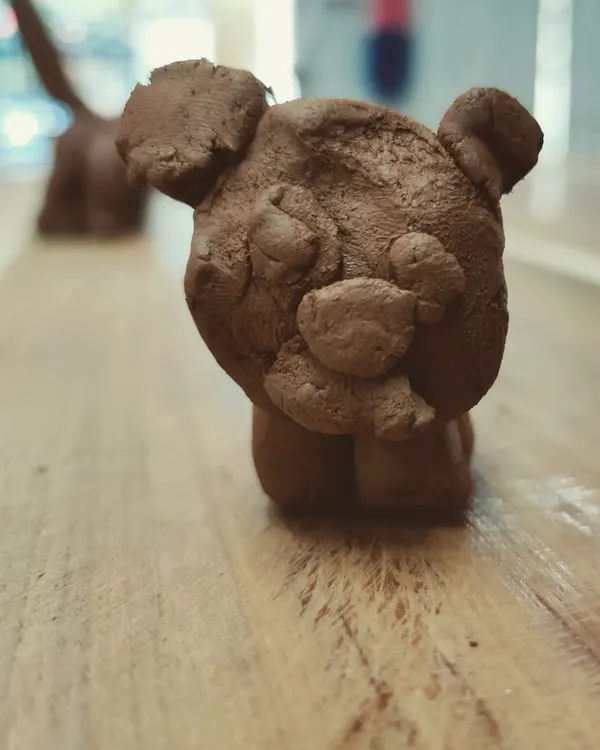 A charming little bear, sculpted with care by one of our young artists. Even simple forms can be full of personality and character.
