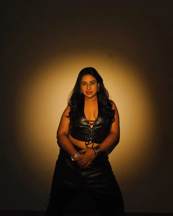 In the spotlight. This look is all about that dark, edgy, and powerful vibe. As an artist, I love expressing different sides of my personality through my style.