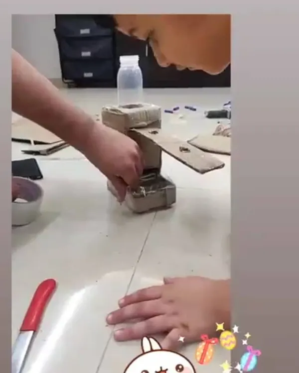 This DIY candy dispenser was a huge hit. Using just cardboard and a small bottle, the children learned to construct a simple machine that really works. It was an engaging, hands-on project that taught them about mechanics in a fun and rewarding way.