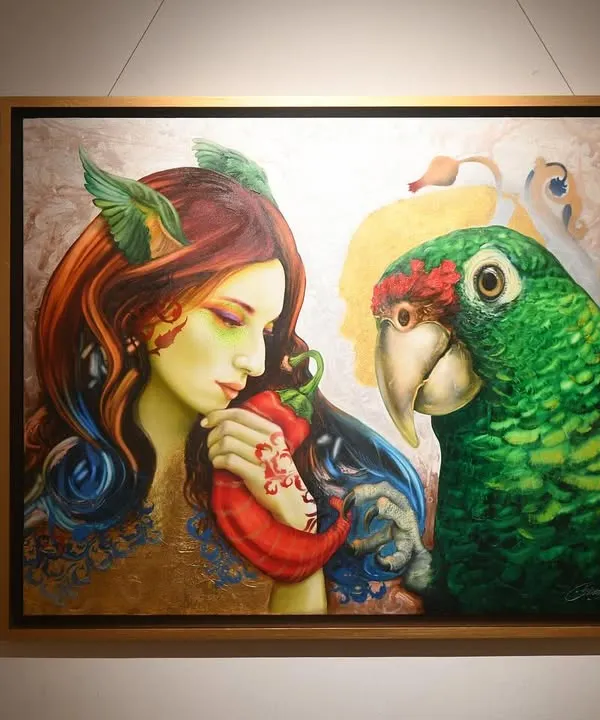 This painting explores the gentle and intimate connection between humans and nature, represented by the woman and the large green parrot. It is a surrealist piece meant to evoke a sense of quiet communication.