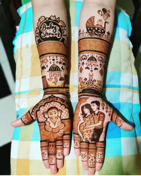 A classic baby shower design celebrating the parents-to-be. This mehandi features a portrait of the couple, a Ganesha motif for blessings, and baby-themed elements like a pram and hanging toys.