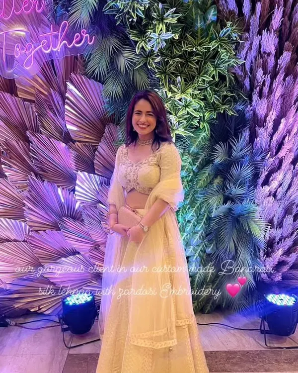 A gorgeous client looking radiant at a wedding in her custom-made Banarasi silk lehenga. I designed this piece with exquisite Zardosi embroidery to create a look of timeless elegance for her special occasion.