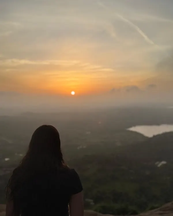 Watching the sun paint the sky from the top of Uttari Betta. This is how we start our Sundays, just a short drive from Bangalore.