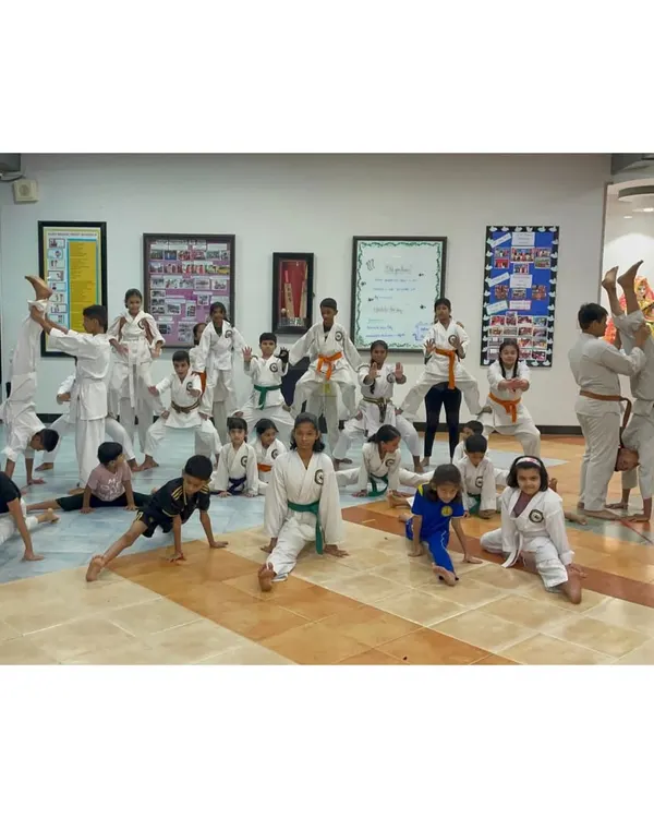 Our young warriors celebrating Independence Day with a display of strength, flexibility, and teamwork. Karate helps build confidence and physical awareness from a young age.
