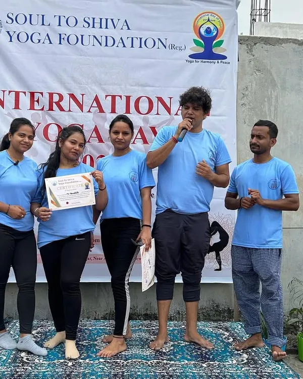 I am proud to present a certificate of completion to our dedicated students during our International Yoga Day event. Each certificate represents a journey of discipline and transformation.