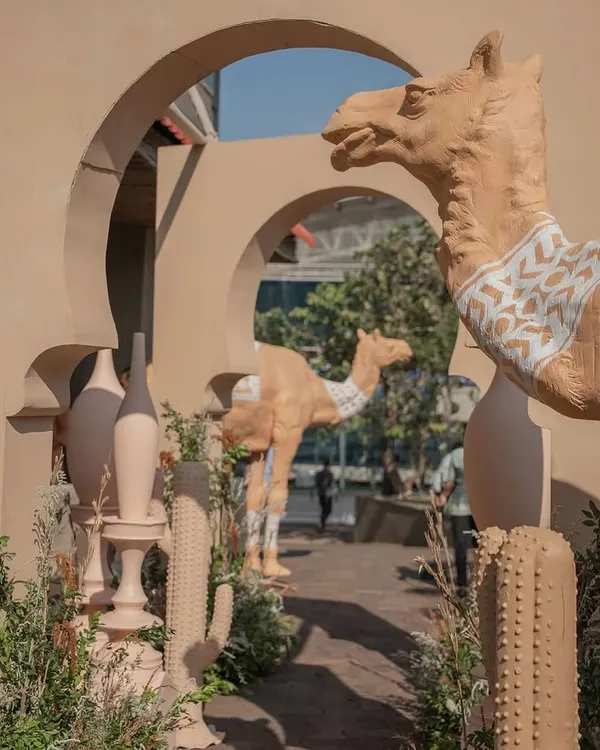 We transformed an open space into a stunning Desert Oasis for a Haldi ceremony, complete with life-sized camel props and custom arches, creating an unforgettable themed entrance for guests.