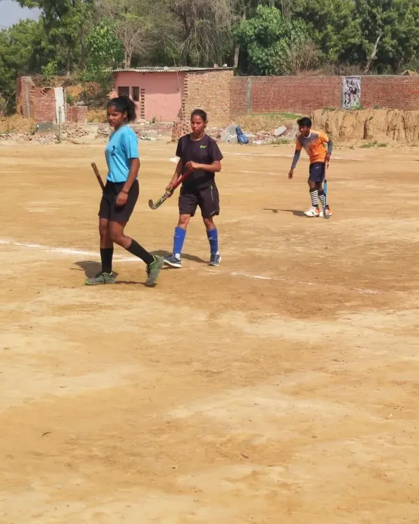We train our players to be versatile on any surface. Here, my sub-junior girls are in action during trials on a traditional dirt ground, showcasing their fundamental skills.
