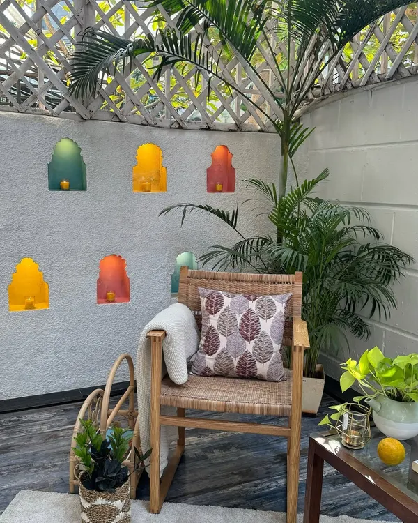 This client chose my cane and wood armchair for their beautiful outdoor patio. The natural materials and simple design work perfectly in this green, serene setting. It's lightweight, comfortable, and built to last.