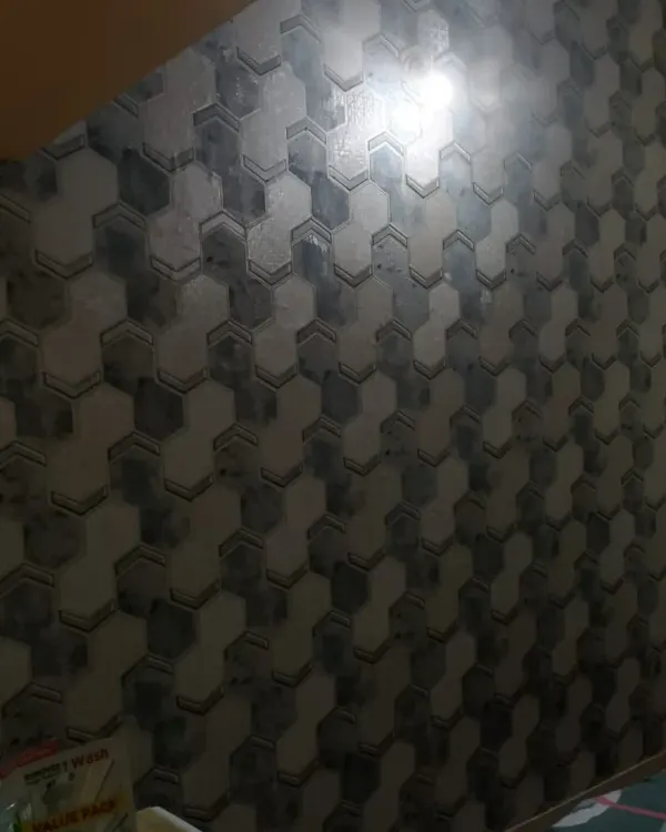 A 3D hexagonal tile wallpaper. The shading on this design creates a convincing optical illusion of depth.