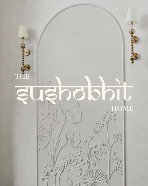 Presenting the 'Sushobit' home, where beauty is felt, not just seen. This custom 3D floral bas-relief panel, framed by an arch and elegant sconces, serves as the home's signature art piece.