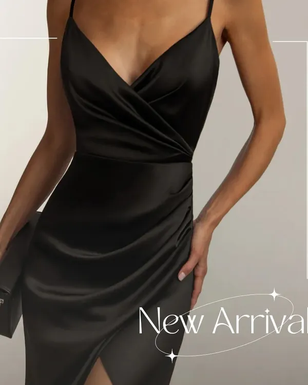 A close-up of the Gianna dress, highlighting the expertly draped satin and wrap-front design that creates a flattering silhouette.