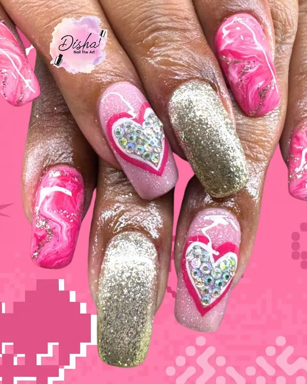 Love at first sight. This bold Valentine's design combines pink marble, full gold glitter, and a sparkling 3D heart charm for the ultimate glam look.
