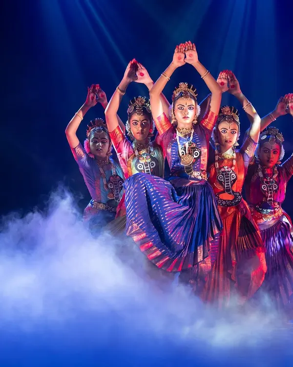 A powerful moment from our theatrical production, 'KRISHNA - Love, Compassion, and Protection'. Here, my dancers embody the collective energy of the universe, captured through dramatic lighting and ethereal stage effects, perfect for creating a memorable experience at large-scale events.