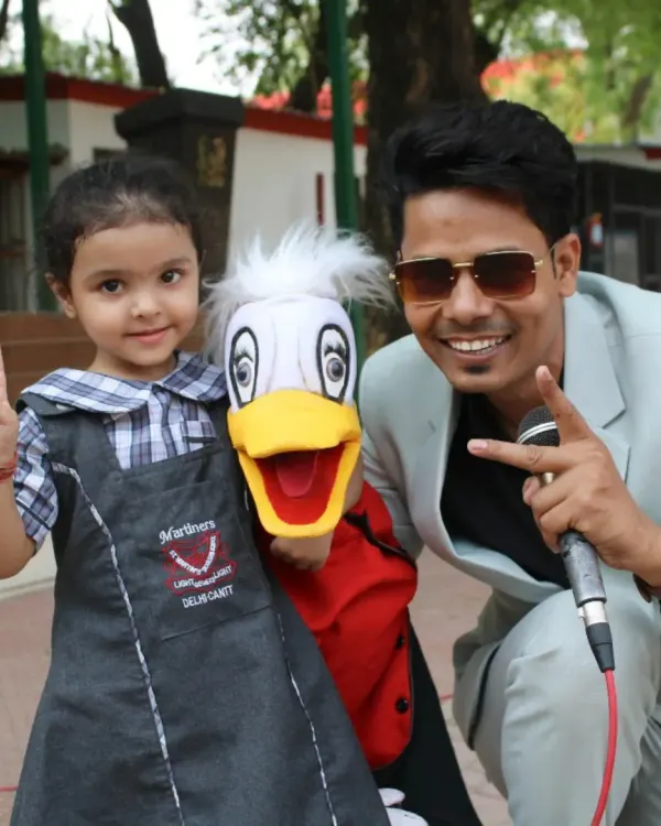 A happy moment with a student and Ducky after a school show. We aim to be approachable and friendly, making the experience memorable for the kids.