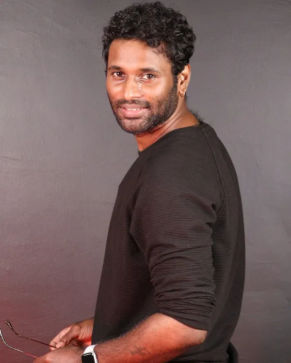 A professional headshot of me, the founder and lead choreographer at GKMovez. I bring my passion for dance to every class.