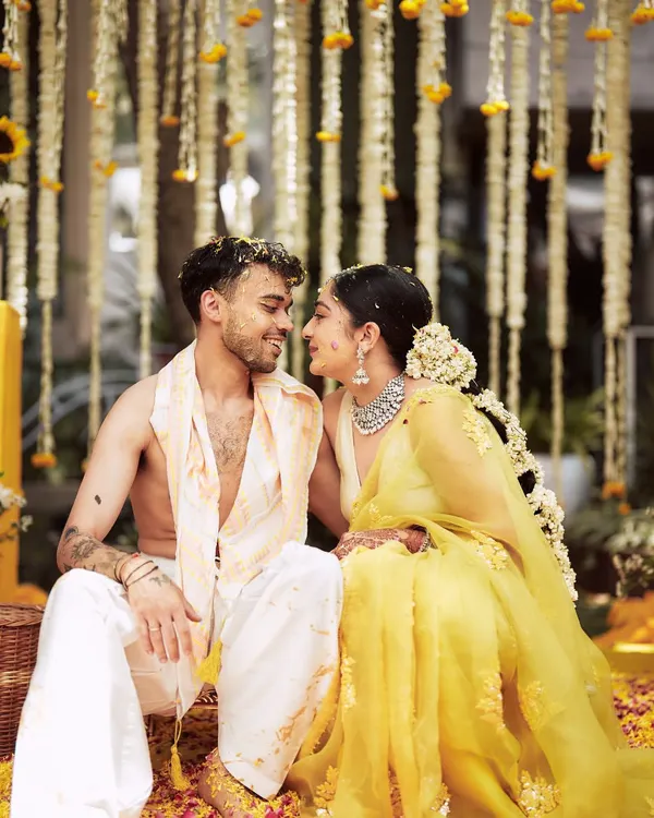 A quiet, loving gaze between the couple during their Haldi ceremony. These are the unscripted moments, filled with pure emotion, that I strive to create space for.