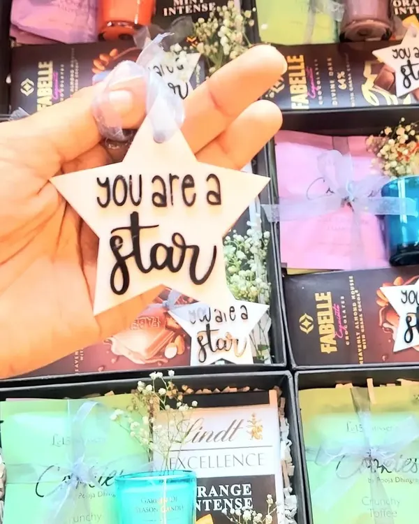 A simple way to celebrate your star employees. We designed these "You are a star" gift tags to accompany our employee recognition hampers, adding a personal touch of appreciation.