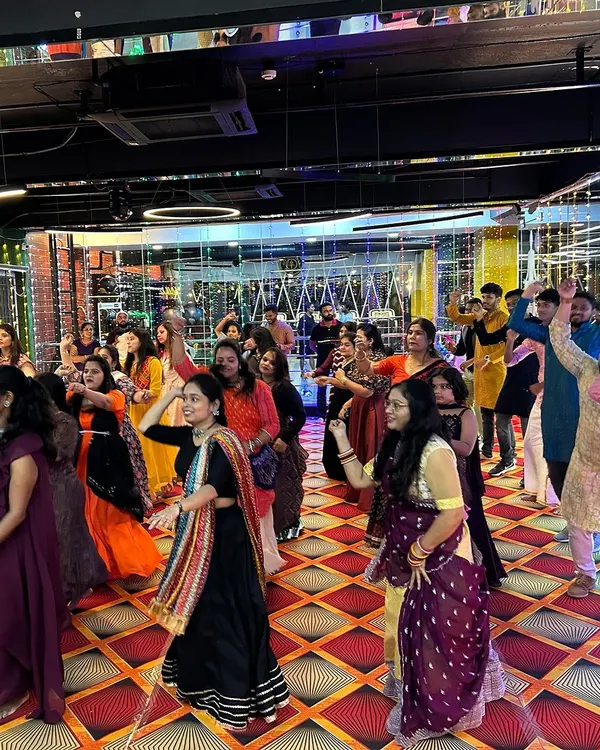 This is the vibe we create together. A full dance floor, tons of energy, and everyone, from your friends to your grandparents, joining in. I choreograph large group sangeet performances that feel like a party.