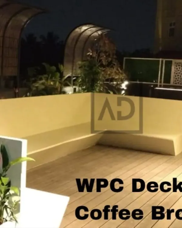 A beautiful terrace featuring my coffee-brown WPC decking. The built-in seating and planters are seamlessly integrated, creating a functional and stylish outdoor lounge area.