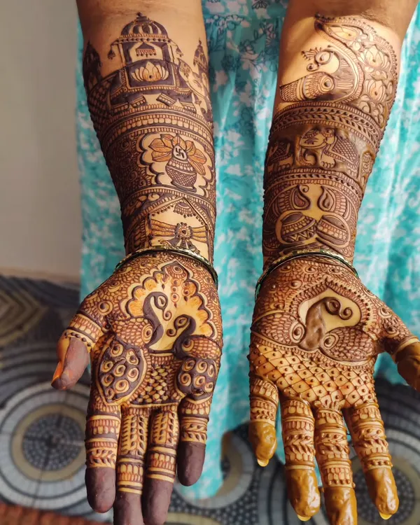 A classic full bridal mehendi, rich with details like peacocks, elephants, and palace architecture. This is the kind of intricate henna art I love to create.