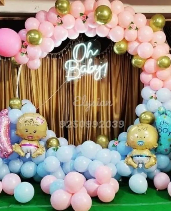 This is one of my most popular baby shower designs, featuring a full balloon arch in classic pink and blue with elegant gold accents. The "Oh Baby!" neon sign creates a perfect, modern photo backdrop for celebrating the parents to be.