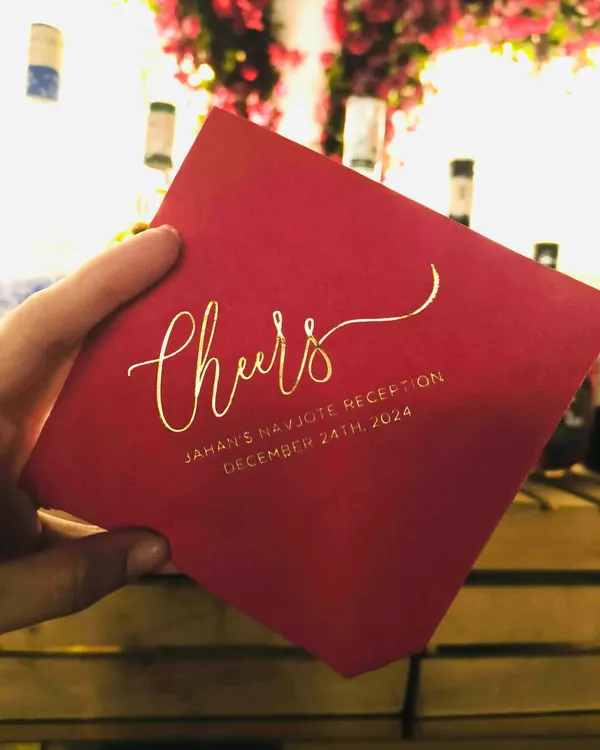 Every detail matters. For this Navjote, we created these elegant custom napkins with gold foil lettering, adding a sophisticated and personal touch to the bar experience.