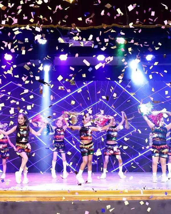 The pure joy of performance. This is the moment all the practice leads to, with our young cheerleaders owning the stage under a shower of confetti during our 'ON STAGE 25' showcase.