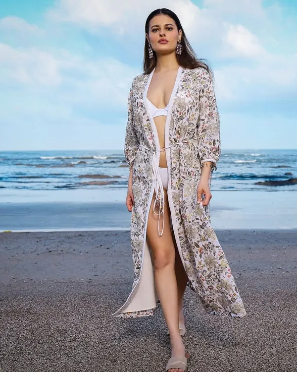 This look captures the essence of effortless beachside elegance. For this resort wear brand shoot, I focused on creating a style that is both unapologetically bold and serenely beautiful, perfect for a luxurious escape.