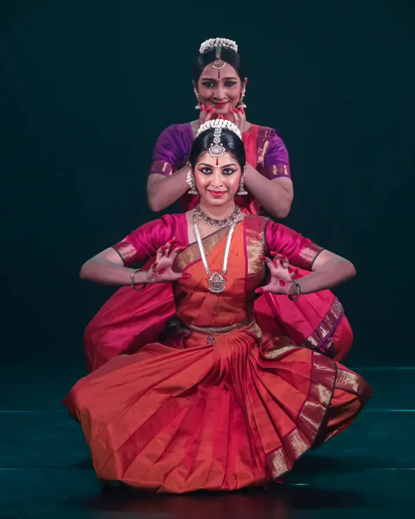 A perfectly symmetrical pose from a duet performance. In my group choreography, I emphasize precision and geometric patterns to create a powerful visual impact on stage.
