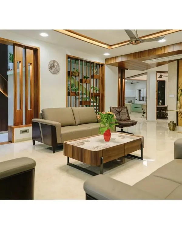 This living room is designed to be the heart of the home, balancing modern comfort with timeless materials. I used solid wood for the partitions and ceiling accents to bring warmth and texture, creating a space that is both open and inviting for family gatherings.