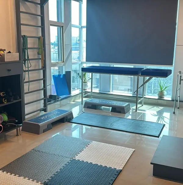 This is my professional space, an exercise therapy clinic where I help clients with a science-backed approach. There are no electrical modalities here, just a focus on pure movement therapy to build long-term health and strength.