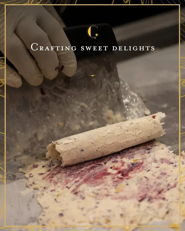 Watch as we craft our signature Mishti Malai. Cream is spread thin on a frozen plate, mixed with fruit and nuts, and then expertly rolled into delicate, frozen scrolls of indulgence.