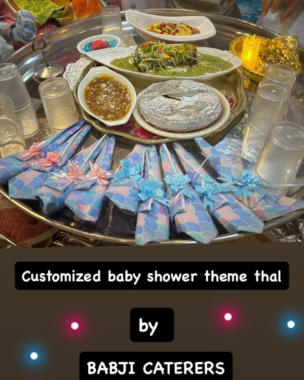 A beautifully customized baby shower theme thal. We love adding personal touches to your celebrations, from the menu to the decor, making your special moments even more memorable.