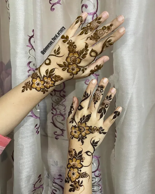 A delicate and modern floral vine design. This style is less dense than bridal mehendi and is perfect for guests, parties, or festivals.