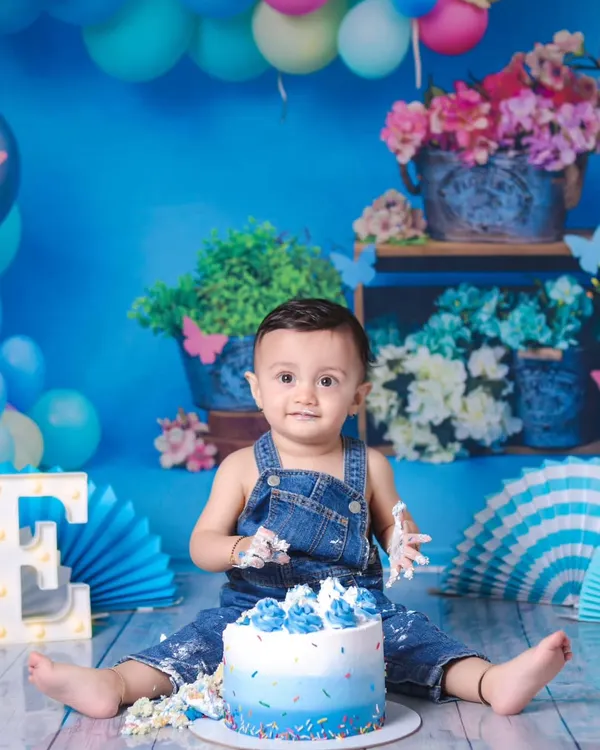 There's nothing cuter than a cake smash! It was a joy to see this little one enjoying his first birthday with one of my blue ombre smash cakes. These moments are just priceless.