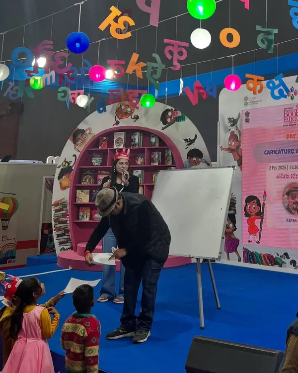 On stage at the World Book Fair 2025, sketching for an audience of enthusiastic students. It was a joy to share my art with them.