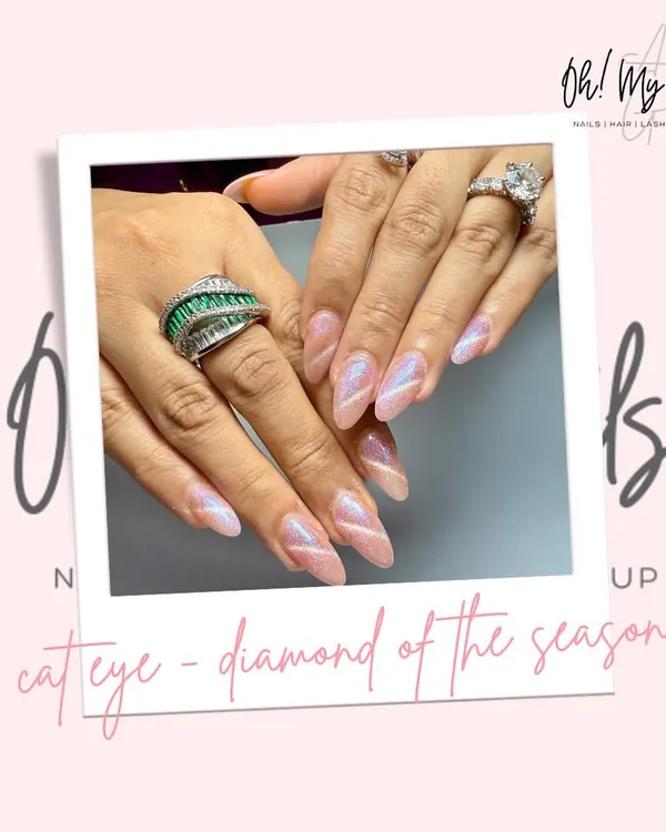 The diamond of the season. This holographic cat eye effect creates a stunning, multi-dimensional shimmer that shifts with the light, making your nails truly mesmerizing.