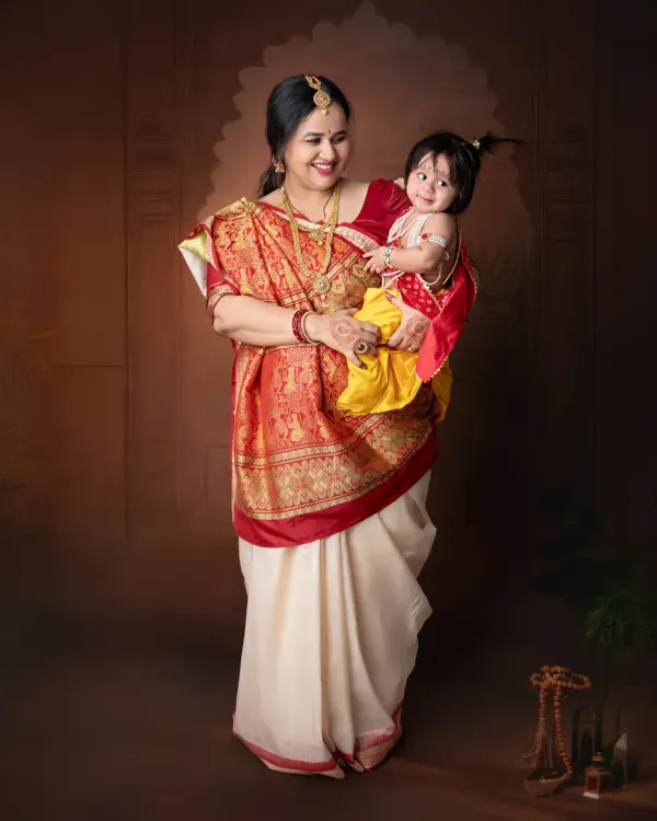 The timeless bond between mother and child, beautifully captured in our traditional 'Yashoda and Kanha' themed shoot.