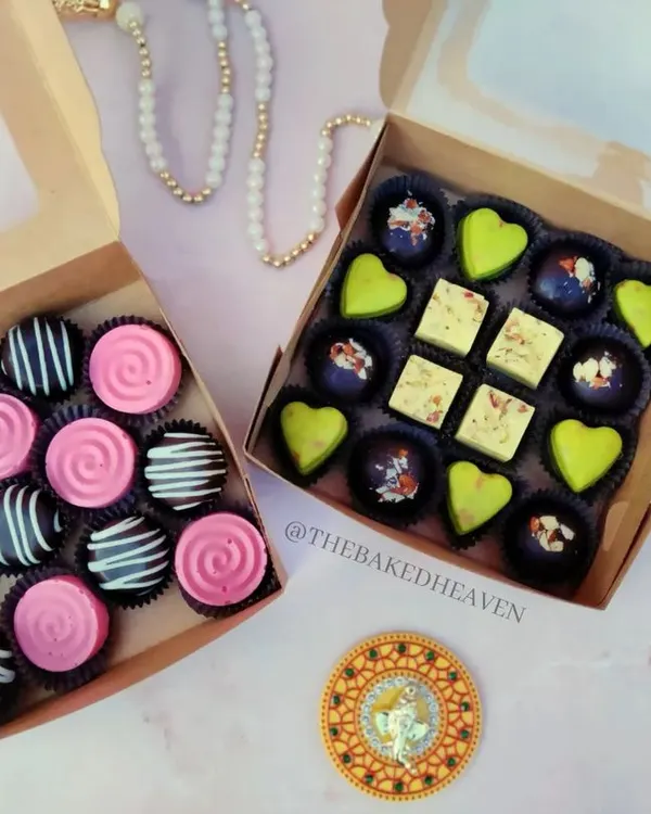 Two of my favourite assorted chocolate boxes, side by side. On the left, a playful mix of Bubblegum and Oreo Crunch. On the right, a desi fusion box with Paan Delight, Rasmalai Pistachio, and Almond Crackle.