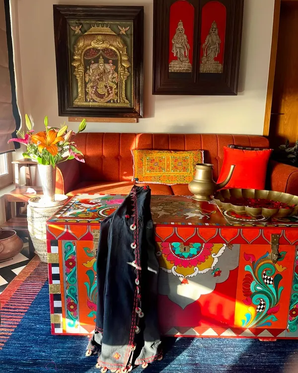 This hand-painted vintage trunk, reimagined as a vibrant coffee table, is the centerpiece of a home. It embodies my passion for giving old objects a new life, blending traditional Kalamkari and temple art motifs with functional design to create a true conversation starter.