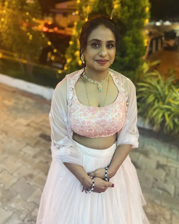 A beautiful and elegant look for a wedding guest. The soft makeup and modern hairstyle are perfect for celebrating in style without overshadowing the bride.