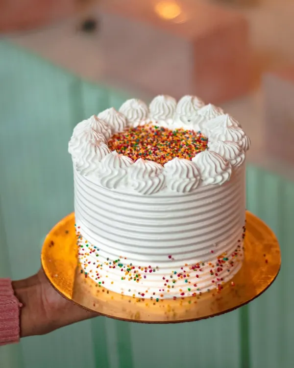 My iconic Tres Leches cake is still a superstar at the bakery. It's a light sponge cake soaked in three kinds of milk, and it's pure heaven.